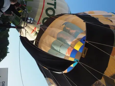 Why do hot air balloons float in the air?